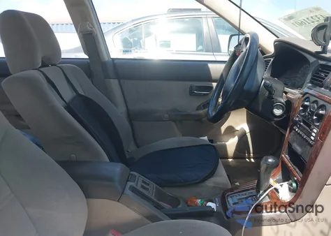 2000 Subaru Outback из США, поврежденный, VIN 4S3BH6652Y7634808